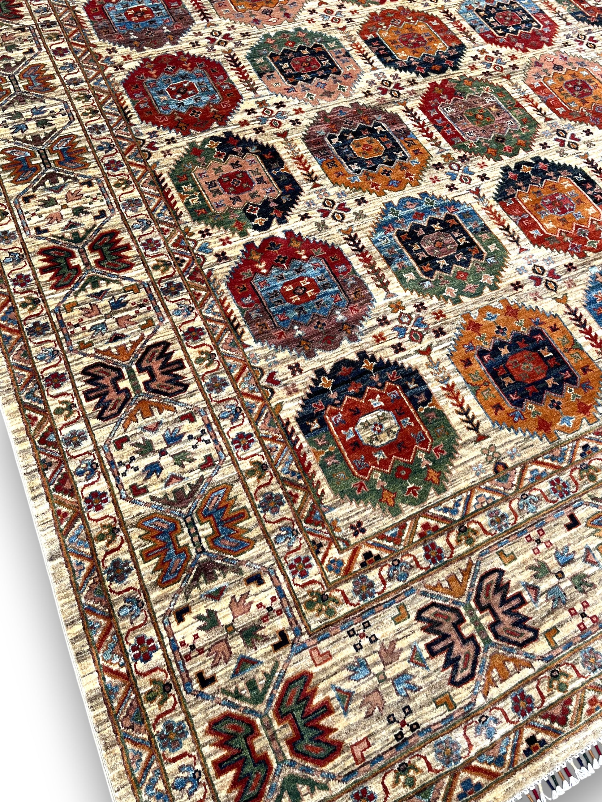 Detailed macro shot of gallery rug knots and natural wool fibers in geometric compartment design