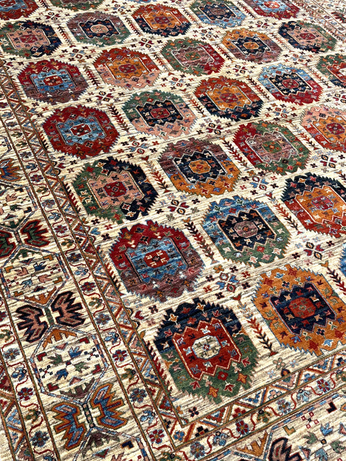 Close-up detail of geometric compartment showing intricate motifs and natural wool texture