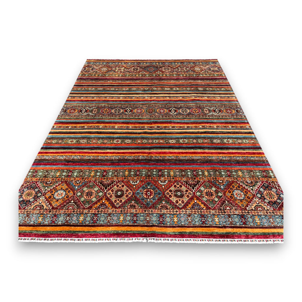 Afghan horizon rug with horizontal stripes featuring geometric patterns and solid earth tones on white background