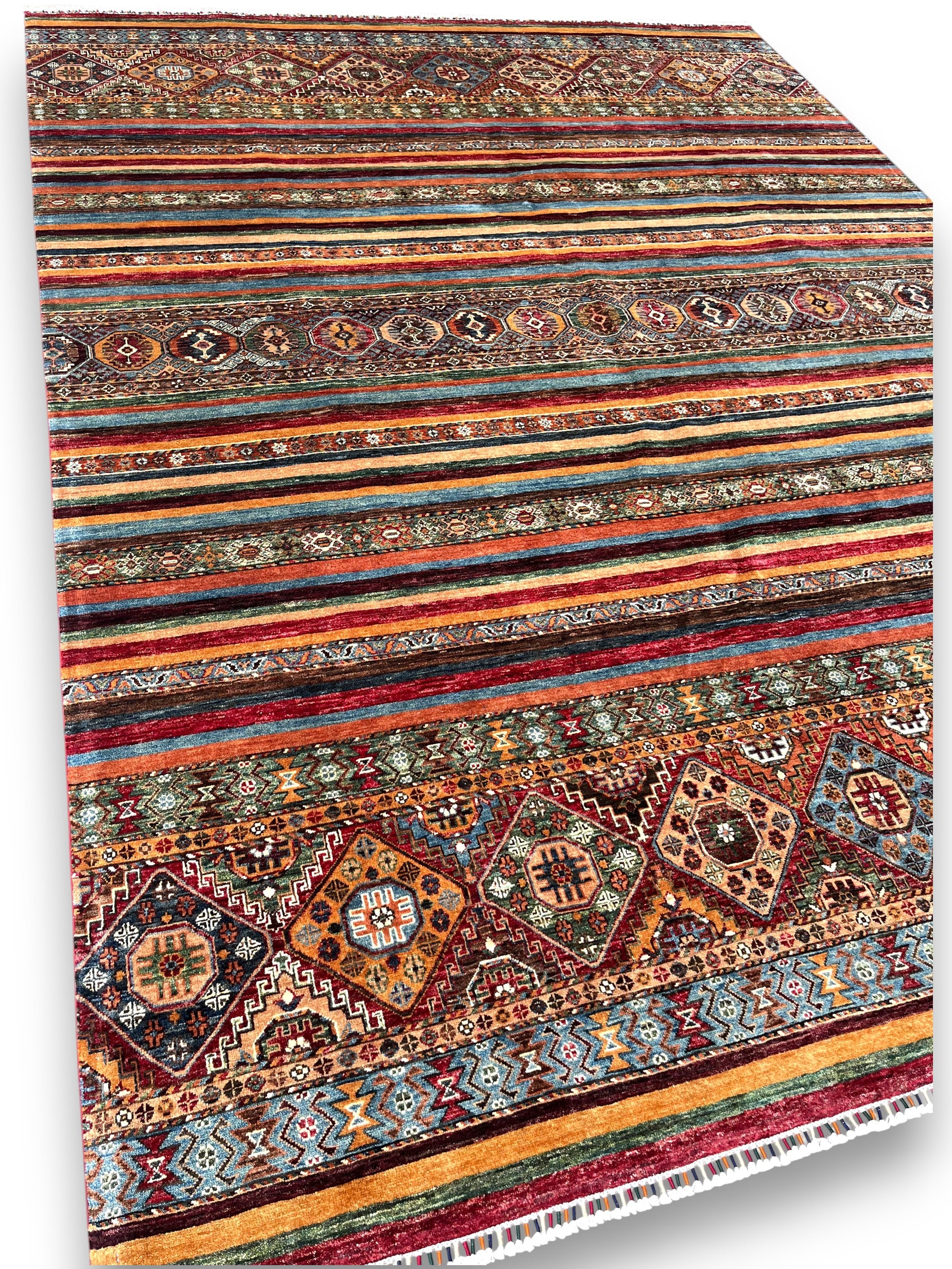 Close-up detail of horizon rug showing geometric diamond patterns and traditional Afghan motifs in striped bands