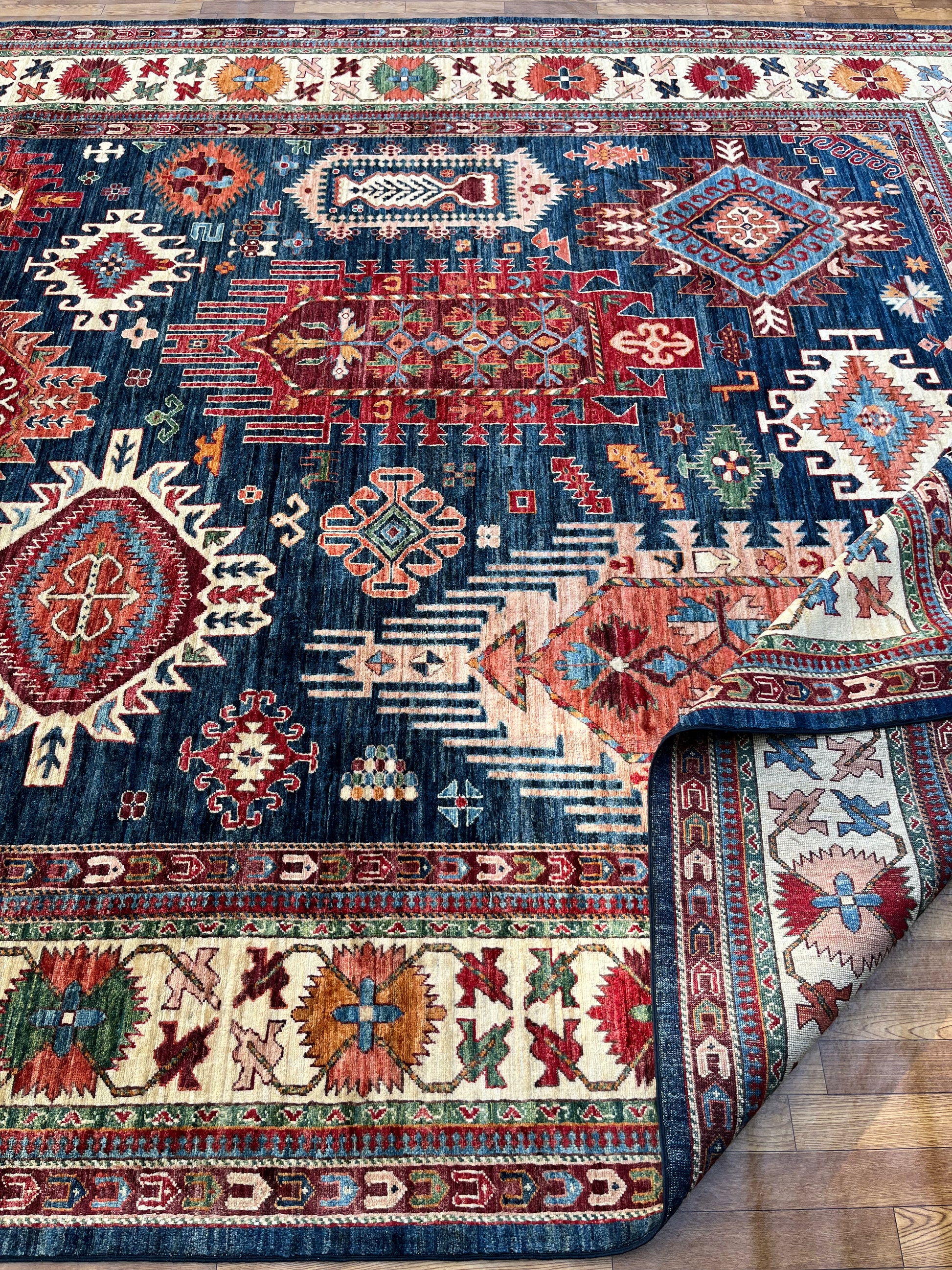 Close-up of Ghazni Rug, an authentic Afghan hand-woven wool rug with intricate traditional patterns, eco-friendly dyes, and artisan craftsmanship.