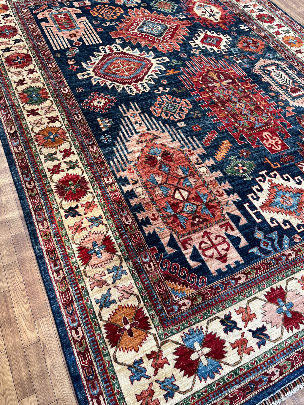 Close-up of Ghazni Rug, an authentic Afghan hand-woven wool rug with intricate traditional patterns, eco-friendly dyes, and artisan craftsmanship.