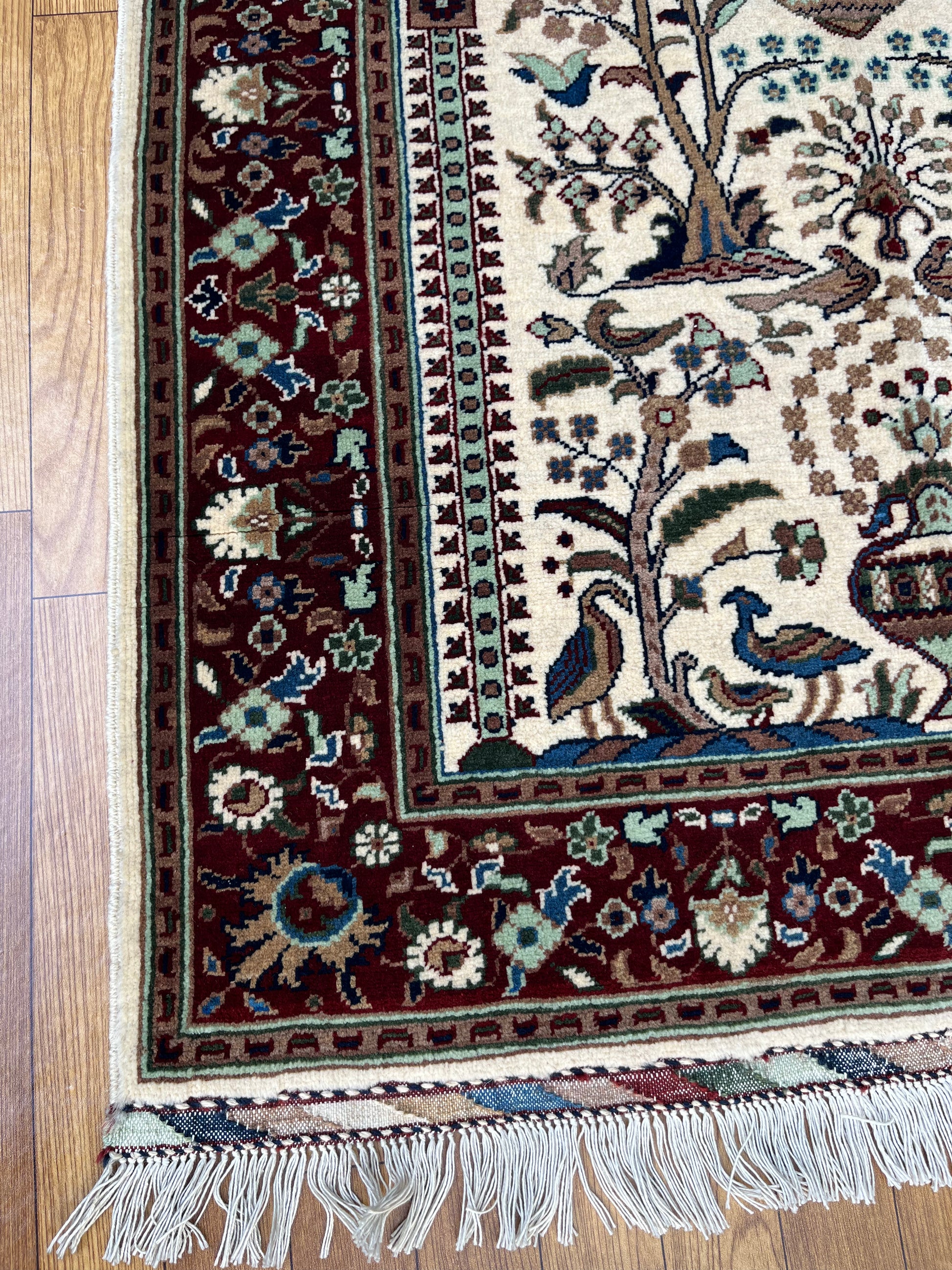Close-up of Ghazni Rug 01, an authentic Afghan hand-woven wool rug with intricate traditional patterns, eco-friendly dyes, and artisan craftsmanship.