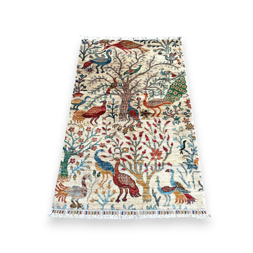 Hand-woven Jowzjan Afghan wool rug featuring intricate traditional patterns, crafted with natural dyes and 100% wool, displayed on a wooden floor.